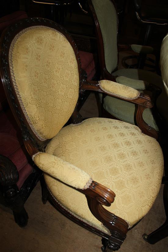 Early Victorian carved rosewood open armchair,